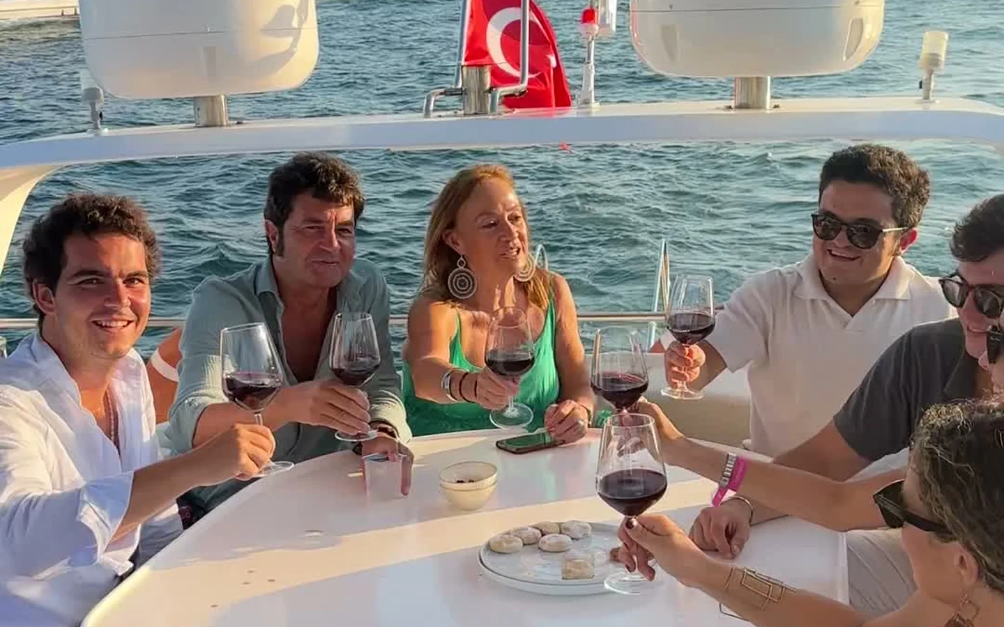 Istanbul yacht charter 2026 — private yacht on the Bosphorus with view of European shoreline used in a TURSAB-licensed Istanbul private charter