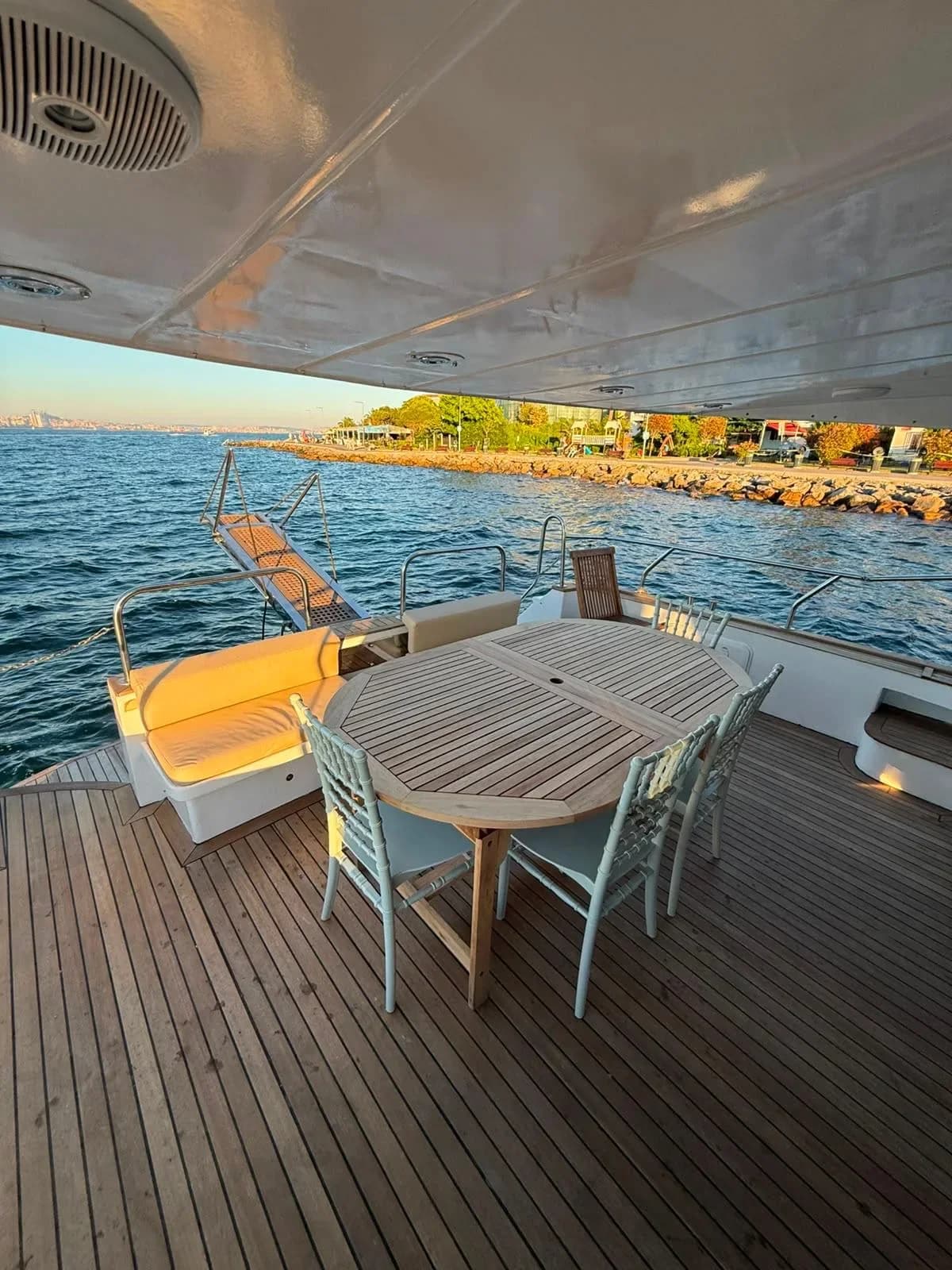 Guests at the lunch table on deck