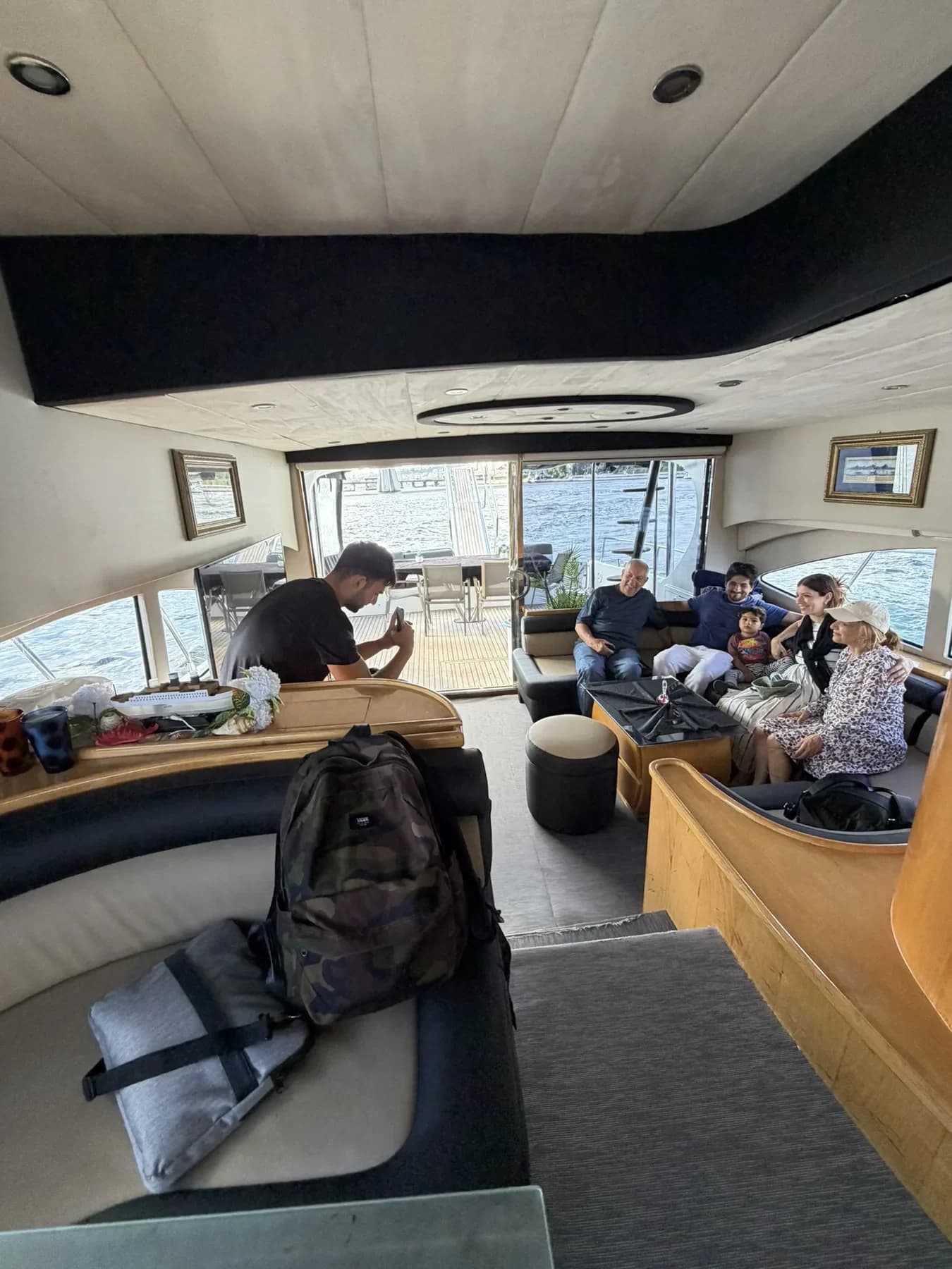 Guests relaxing in a yacht saloon